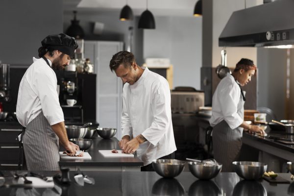 chef-working-together-professional-kitchen-scaled.jpg